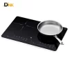 Ảnh Bếp Wmf Kult X Chụp Góc Nghiêng Trên Nền Trắng, Có Chảo Inox Ở Vùng Nấu Bên Phải Và Vùng Bên Trái Để Trống. Bếp Từ Đôi Wmf Kult X Với Chảo Inox Đặt Trên Vùng Nấu Bên Phải