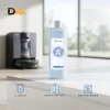Hình Giới Thiệu Chai Ecovacs Deebot Cleaning Solution 1L Cùng Các Biểu Tượng Về Dung Tích Và Khả Năng Hỗ Trợ Vệ Sinh Sàn, Khăn Lau. Chai Nước Lau Sàn Ecovacs Deebot 1L Đặt Trên Bàn, Phía Sau Là Robot Và Trạm Sạc.